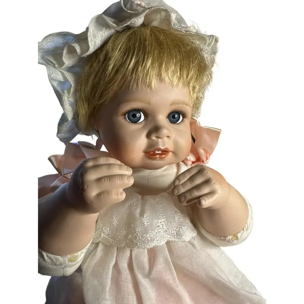 Doll  This beautiful porcelain doll from The Hamilton Collection is a must-have